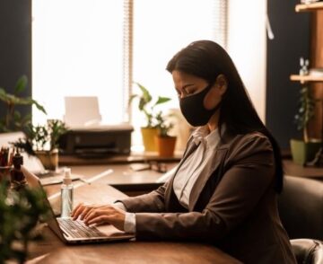Asian woman on computer